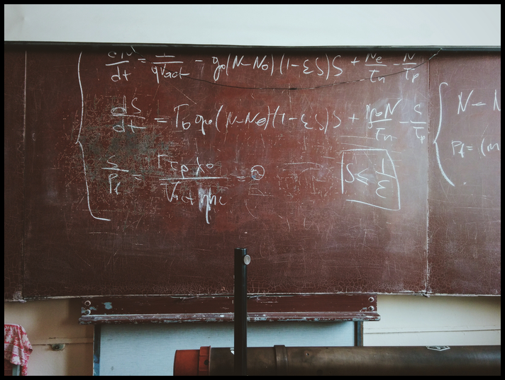 A blackboard with math notation.