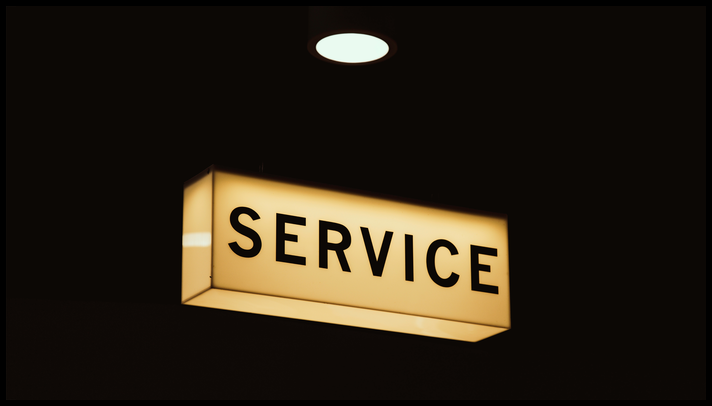 Luminous box with the word service on it in block capitals.